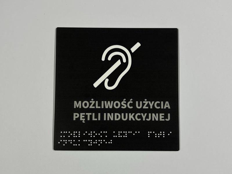 Tabliczka informacyjna w brajlu i czarnym druku z piktogramem  Tabliczka informacyjna w brajlu i czarnym druku z piktogramem
