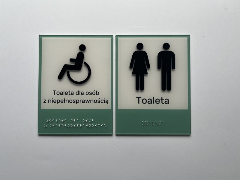 Dotykowe tabliczki informacyjne w czarnym druku i w brajlu, z piktogramami Dotykowe tabliczki informacyjne w czarnym druku i w brajlu, z piktogramami